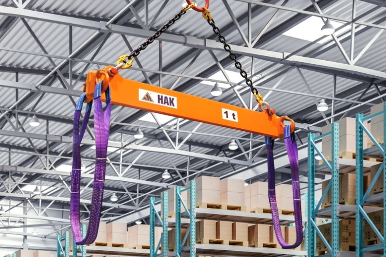 Lifting beam for transporting rod bundles
